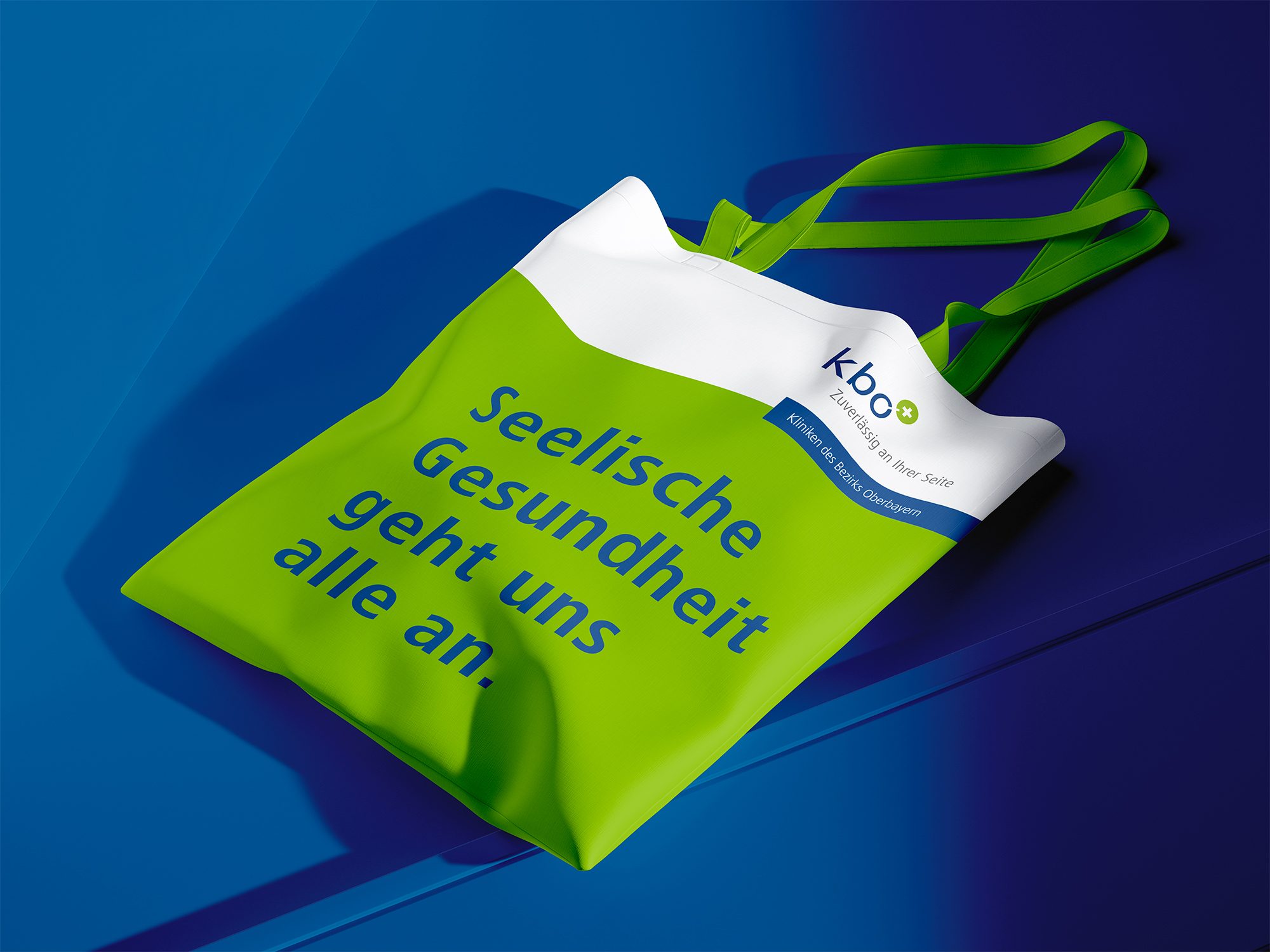 kbo tote bag with the line “Mental health concerns us all.”